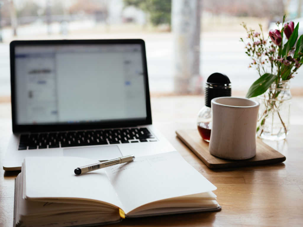 Macbook and note book